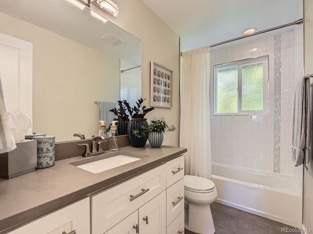 4196 S Reading Way, Denver, CO 80237 - full bath featuring toilet, vanity, shower / tub combo with curtain, and tile patterned flooring