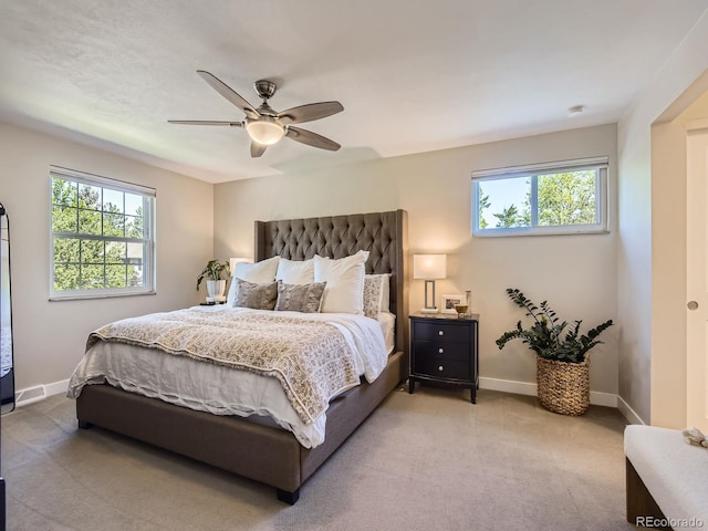 4196 S Reading Way, Denver, CO 80237 - bedroom with multiple windows, baseboards, light carpet, and ceiling fan