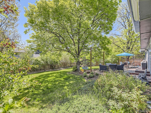 4196 S Reading Way, Denver, CO 80237 - view of yard with an outdoor living space and a patio