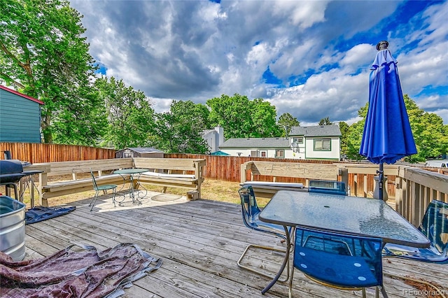 4848 S Pitkin Way, Aurora, CO 80015 - deck with outdoor dining area and a fenced backyard