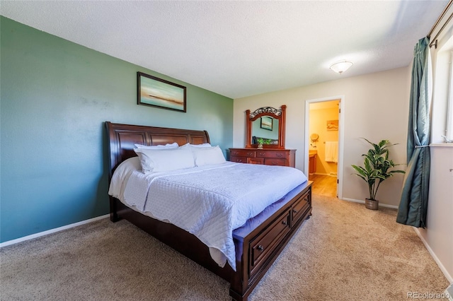 14347 E 134th Ave, Brighton, CO 80601 - bedroom featuring light carpet, baseboards, and connected bathroom