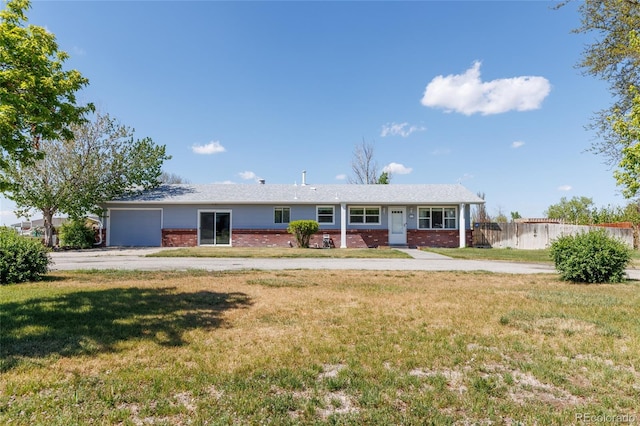 14347 E 134th Ave, Brighton, CO 80601 - ranch-style home with brick siding and a garage
