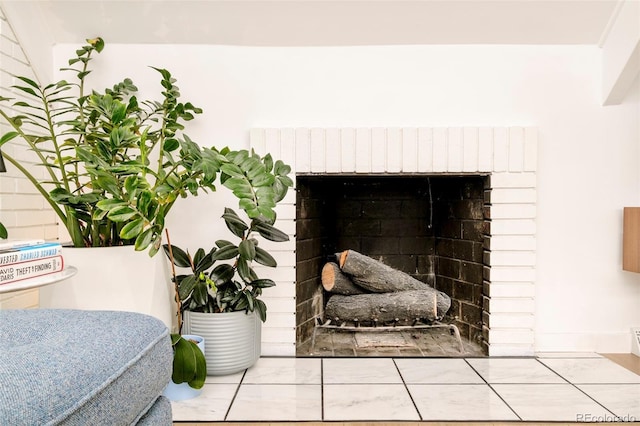 1884 S Ivy St, Denver, CO 80224 - detailed view of a brick fireplace and baseboards