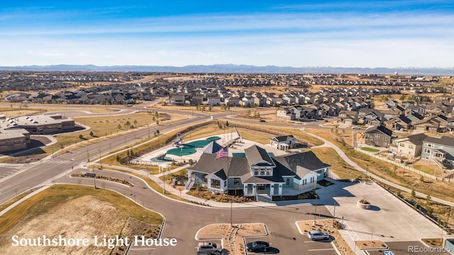 aerial view featuring a mountain view and a residential view