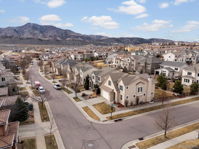 bird's eye view with a mountain view and a residential view