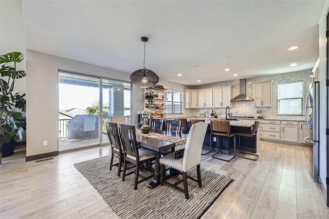 16345 Spanish Peak Way, Broomfield, CO 80023 - dining room featuring light wood-style flooring