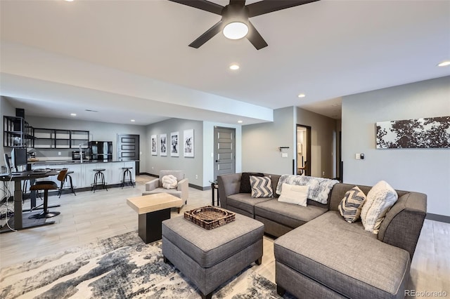 16345 Spanish Peak Way, Broomfield, CO 80023 - living room with recessed lighting, ceiling fan, light wood-type flooring, and baseboards