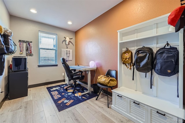 16345 Spanish Peak Way, Broomfield, CO 80023 - office with light wood-style flooring, a textured wall, baseboards, and recessed lighting