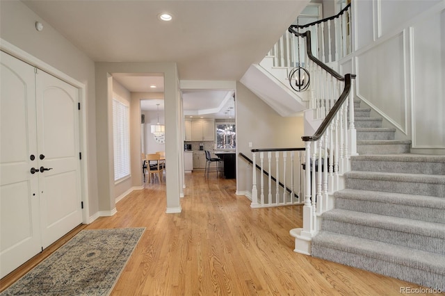 foyer entrance featuring light hardwood / wood-style floors