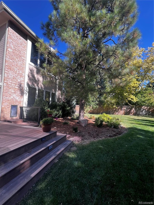 view of yard with a deck