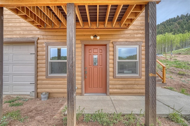 18766 State Highway 67, Divide, CO 80814 - view of exterior entry featuring faux log siding