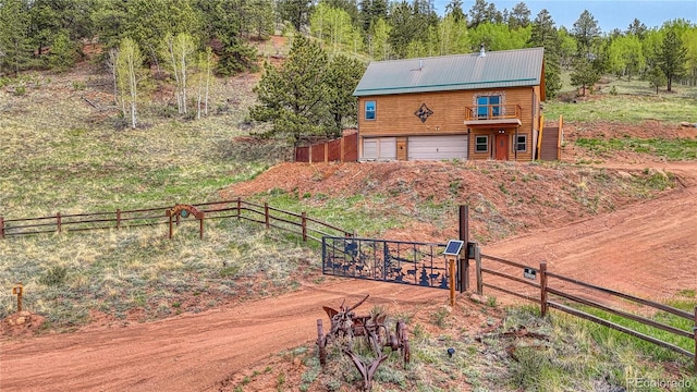18766 State Highway 67, Divide, CO 80814 - back of house with a garage and a deck