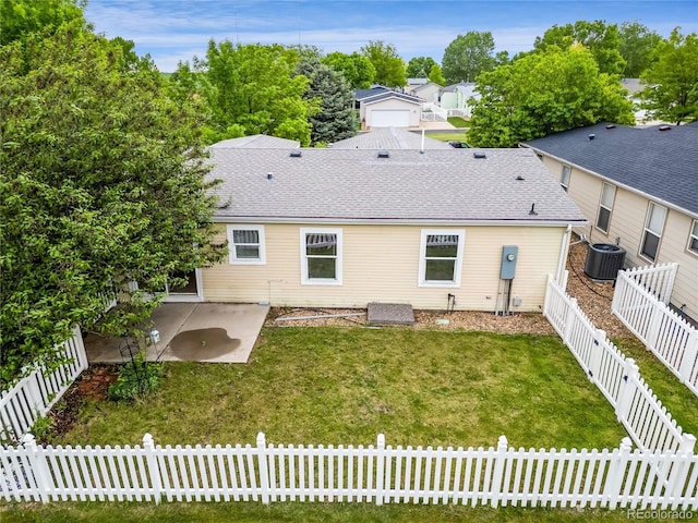 7725 Hummingbird Grn Unit 78, Frederick, CO 80530 - rear view of house featuring a patio area, roof with shingles, and central AC