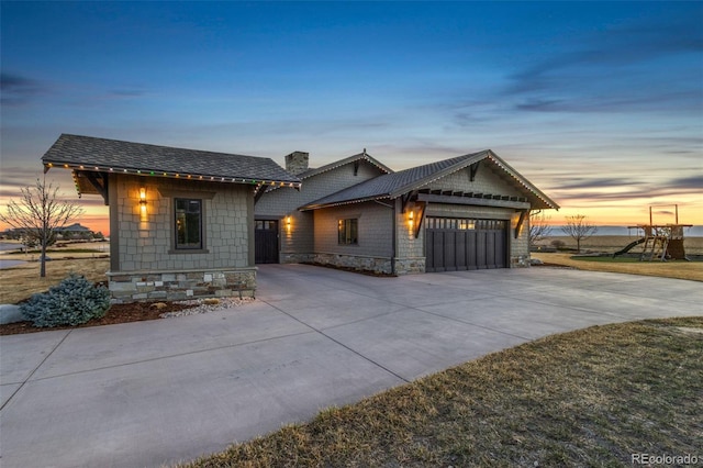 3947 Taliesin Way, Fort Collins, CO 80524 - view of front facade with a chimney, an attached garage, concrete driveway, and a playground