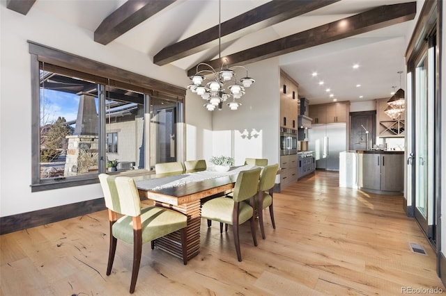 3947 Taliesin Way, Fort Collins, CO 80524 - dining space featuring visible vents, recessed lighting, light wood finished floors, a chandelier, and vaulted ceiling with beams