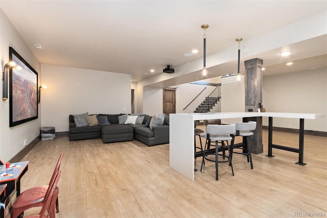 3947 Taliesin Way, Fort Collins, CO 80524 - living area featuring stairs, recessed lighting, baseboards, and light wood finished floors