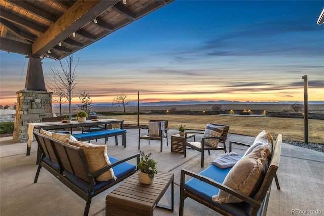 3947 Taliesin Way, Fort Collins, CO 80524 - view of patio / terrace featuring a mountain view and an outdoor hangout area