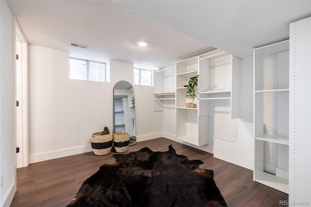 interior space with dark hardwood / wood-style floors