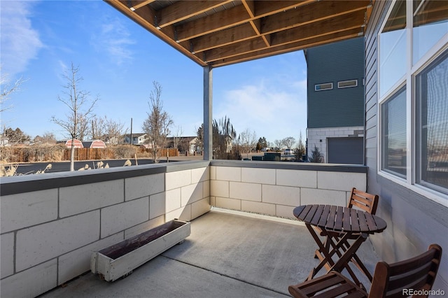 view of patio with a balcony