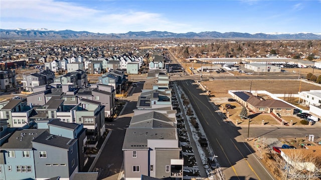 aerial view featuring a mountain view and a residential view