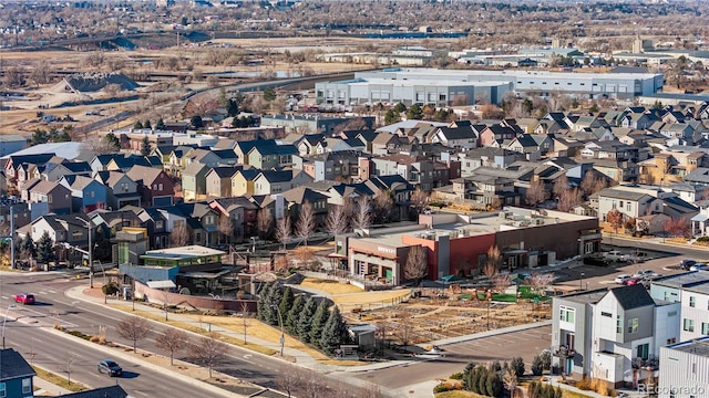 birds eye view of property with a residential view