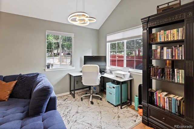 8997 W 88th Ave, Westminster, CO 80021 - office space with vaulted ceiling and a chandelier