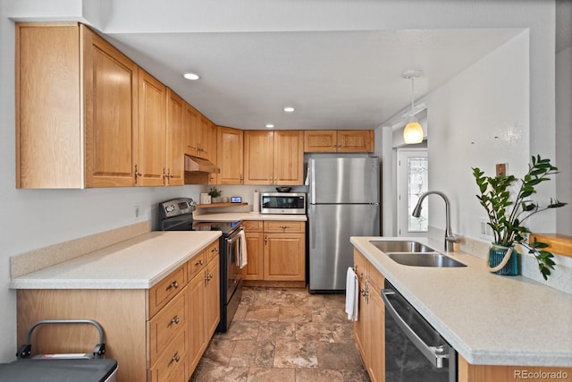 8997 W 88th Ave, Westminster, CO 80021 - kitchen with stainless steel appliances, under cabinet range hood, stone finish flooring, light countertops, and recessed lighting