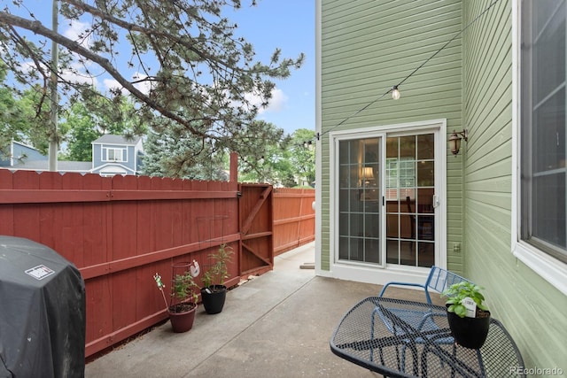 8997 W 88th Ave, Westminster, CO 80021 - view of patio / terrace with grilling area and a gate