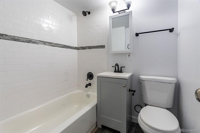530 Illinois St, Penrose, CO 81240 - full bathroom with tiled shower / bath, vanity, and toilet