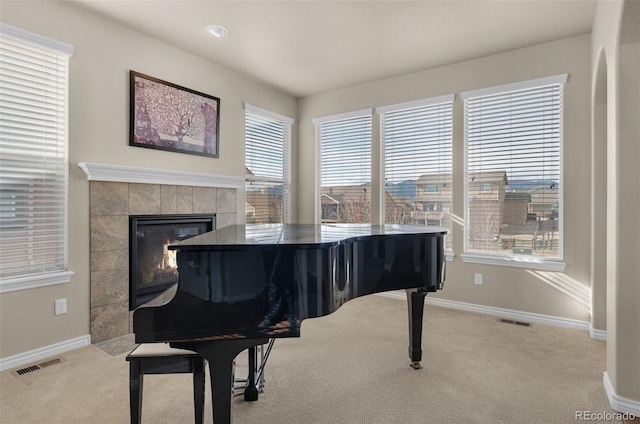 1053 Crystal Basin Dr, Colorado Springs, CO 80921 - sitting room featuring carpet flooring and a tiled fireplace