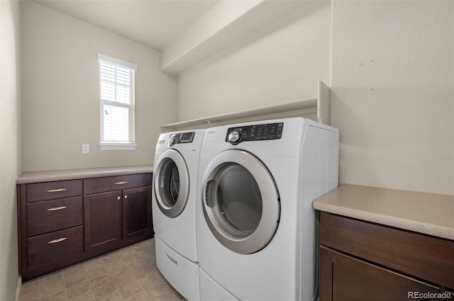 clothes washing area with independent washer and dryer