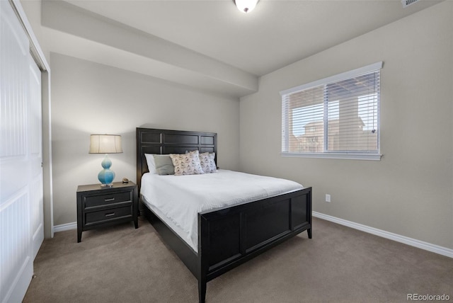 bedroom featuring light colored carpet