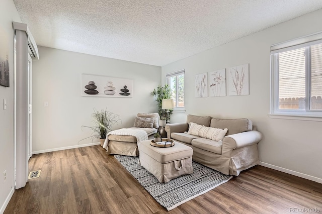8993 W 88th Pl, Westminster, CO 80021 - living room with wood finished floors and a textured ceiling