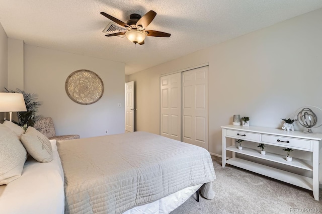 8993 W 88th Pl, Westminster, CO 80021 - bedroom with carpet flooring, a closet, ceiling fan, and a textured ceiling