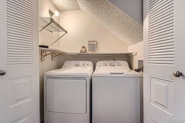 8993 W 88th Pl, Westminster, CO 80021 - laundry room featuring a textured ceiling and washing machine and dryer