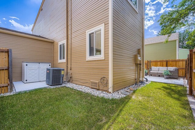 8993 W 88th Pl, Westminster, CO 80021 - view of home's exterior featuring an outdoor living space and a patio area