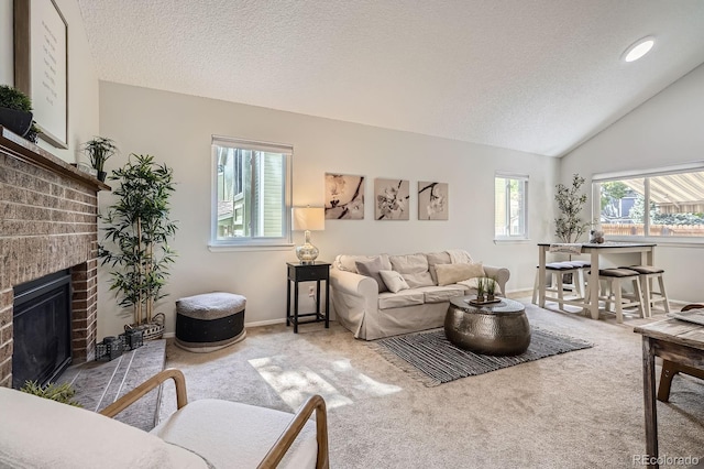 8993 W 88th Pl, Westminster, CO 80021 - living area with carpet floors, a textured ceiling, a fireplace, and lofted ceiling