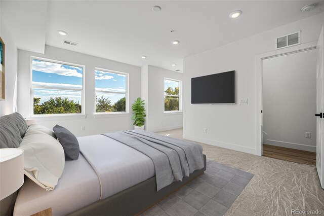 bedroom with light hardwood / wood-style flooring