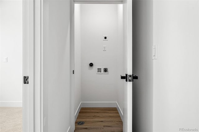 washroom featuring hardwood / wood-style floors, hookup for a washing machine, and electric dryer hookup