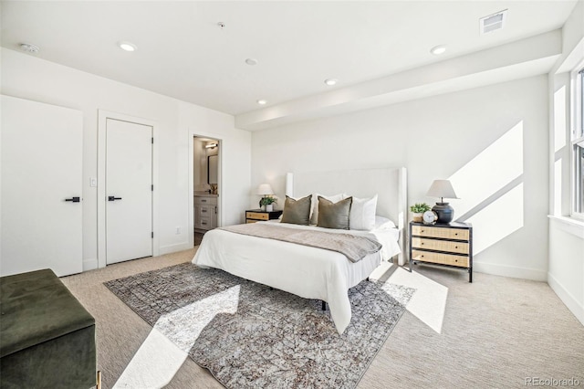 bedroom featuring light colored carpet, visible vents, baseboards, and recessed lighting