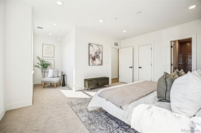 bedroom with recessed lighting, visible vents, baseboards, and light colored carpet