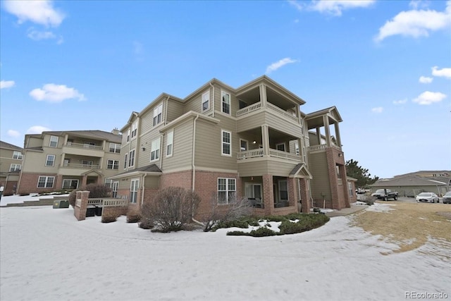 view of snow covered property