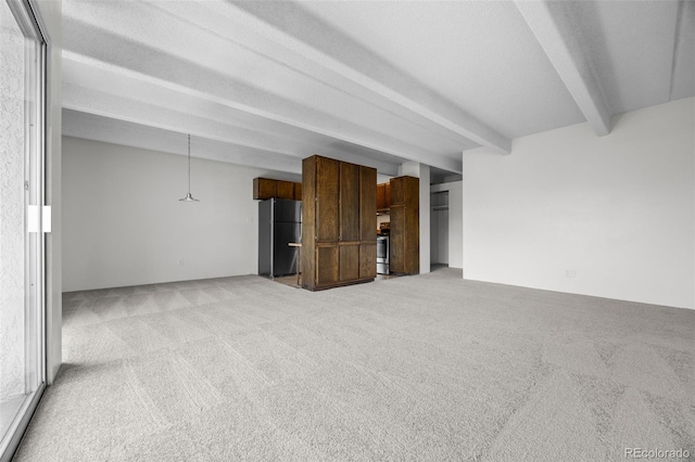 1255 N Ogden St Unit 406, Denver, CO 80218 - unfurnished living room featuring beam ceiling and light colored carpet