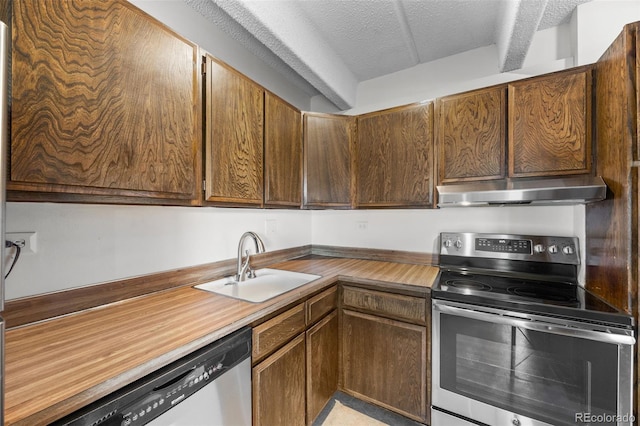 1255 N Ogden St Unit 406, Denver, CO 80218 - kitchen with stainless steel electric stove, under cabinet range hood, dishwasher, and a textured ceiling