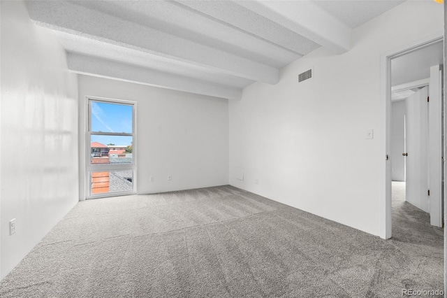 1255 N Ogden St Unit 406, Denver, CO 80218 - unfurnished room with carpet and beamed ceiling