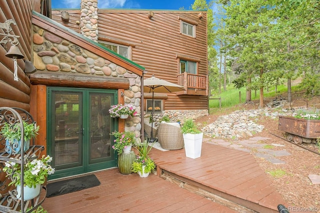 31112 Shadow Mountain Dr, Conifer, CO 80433 - wooden deck with french doors