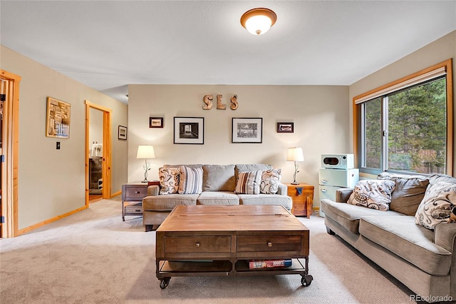 31112 Shadow Mountain Dr, Conifer, CO 80433 - living area featuring light colored carpet and baseboards
