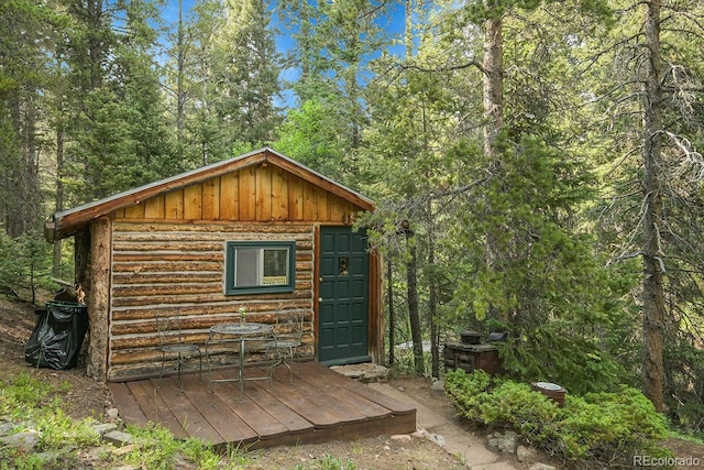 31112 Shadow Mountain Dr, Conifer, CO 80433 - view of outbuilding featuring a view of trees