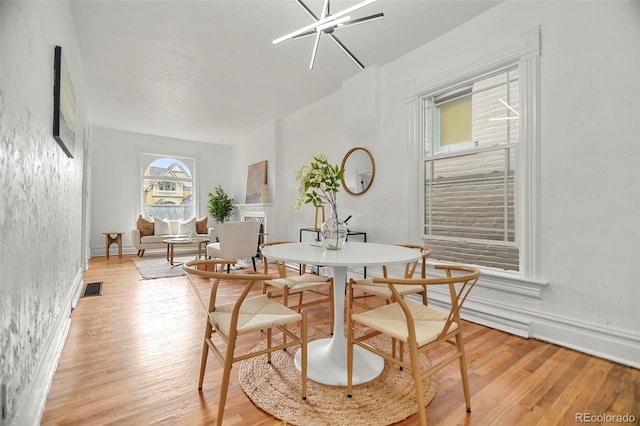 dining room featuring light hardwood / wood-style flooring