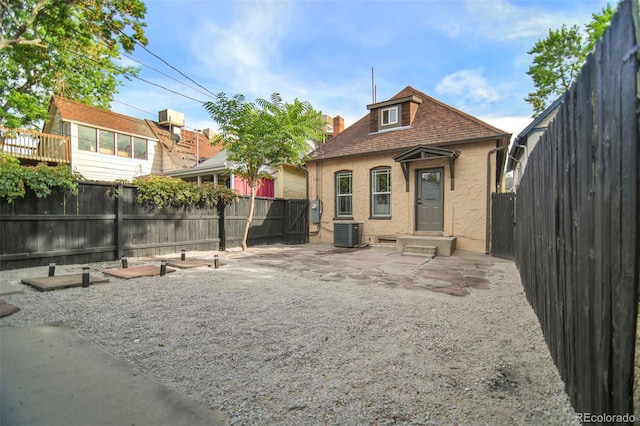 view of front of property with cooling unit